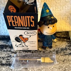 New but open box Peanuts Halloween Blind Box Figurine of Lucy. Collectible